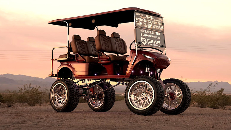 Picture of a golf cart with major lift kit