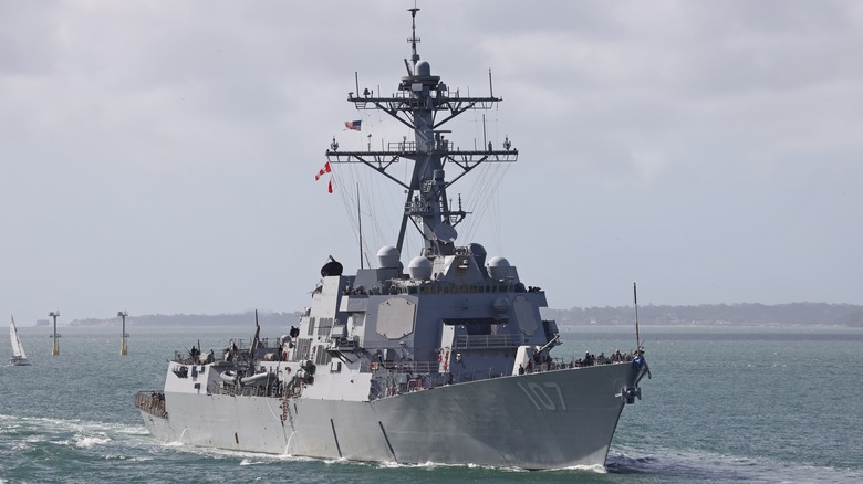 USS Gravely cruising near shoreline