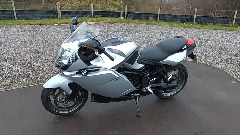 A silver BMW K 1200 S parked