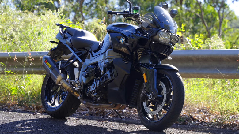 A black BMW K 1300 R parked on the side of the road