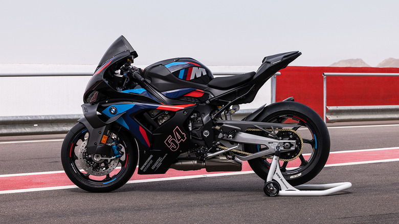The 2025 BMW M 1000 RR parked on a racetrack