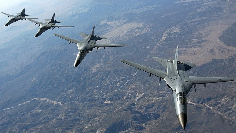 A group of F-111 Aardvarks in flight