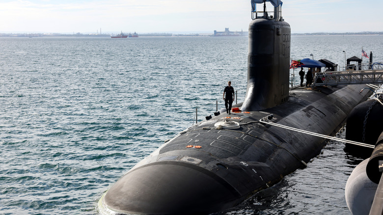 Guards holding watch over the USS Minnesota, officially known as SSN 783, a Virginia class fast attack submarine