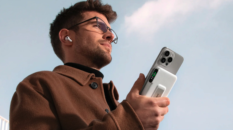 Man holding Anker MagGo Power Bank