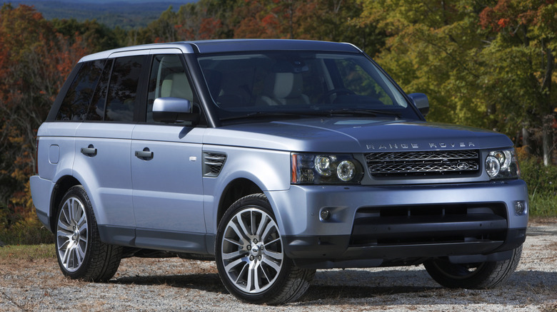 Blue 2010 Range Rover Sport parked in nature