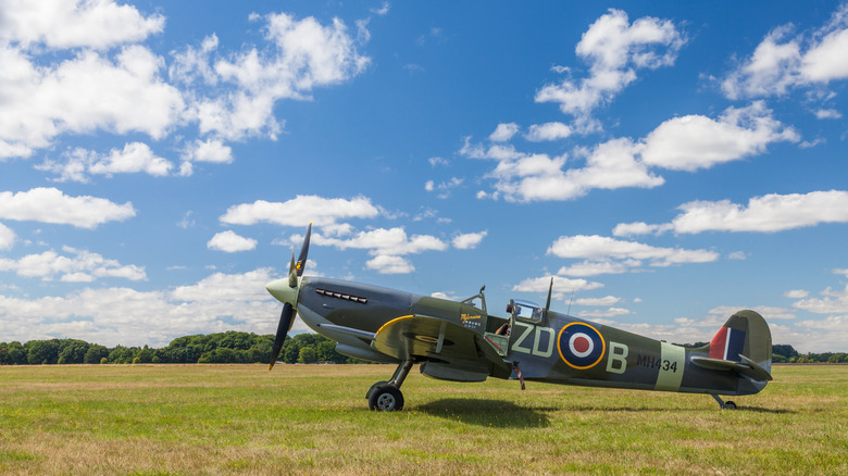 Empty Supermarine Spitfire on grassy field