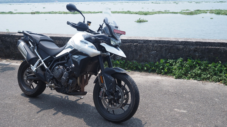 A silver and red Ducati Multistrada V4 S parked
