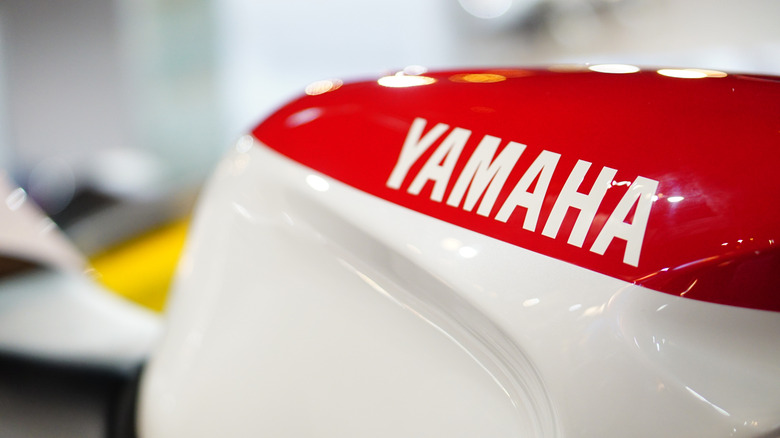 A Yamaha TZR 250 in red, white, and yellow color