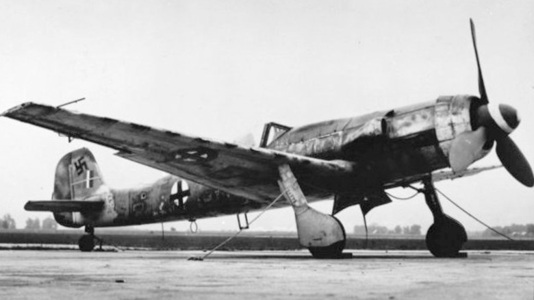 A Focke-Wulf Ta 152 parked on a tarmac during WWII
