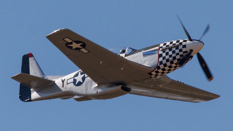A North American P-51 Mustang flying at an air show in 2014