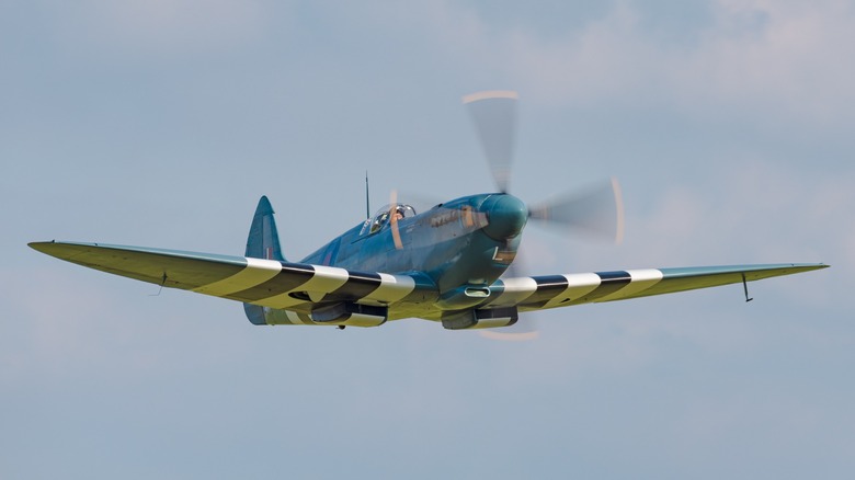 A Supermarine Spitfire XI flying at an event in 2024.