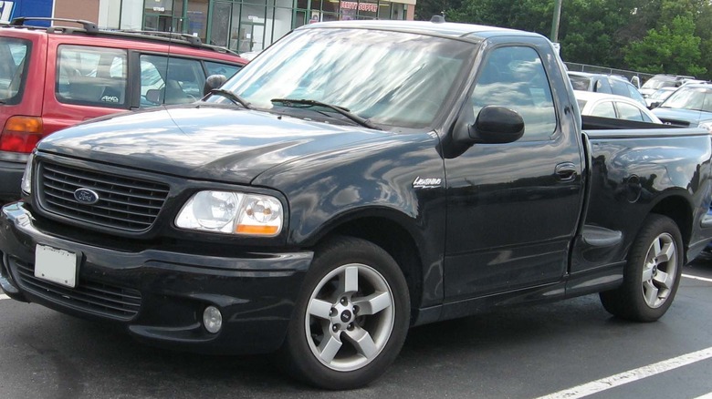 A Ford SVT Lightning truck parked in a lot