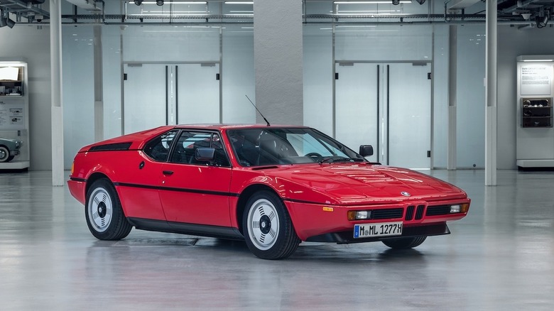 A red BMW M1 sits in pristine condition, even though it had a short production run