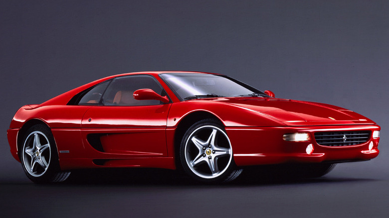 A red 1999 Ferrari F355 Berlinetta