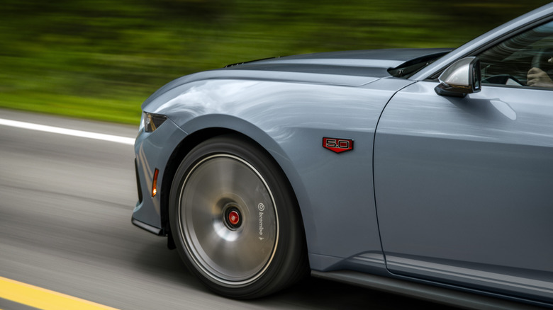 Side fender dynamic shot of a 2025 Ford Mustang 60th Anniversary