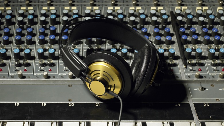 headphones on an audio mixer