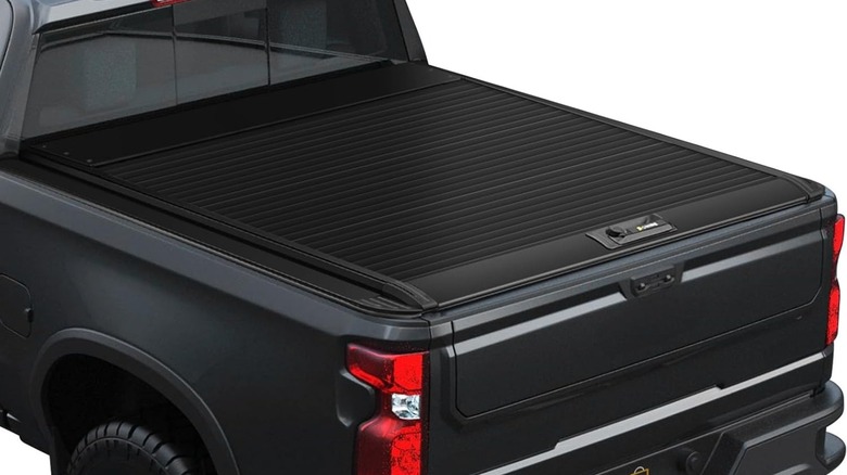 The Onine retractable truck bed cover in use on a pickup.