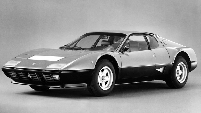 1976 Ferrari 512 BB, black-and-white photo, front-left 3/4 view
