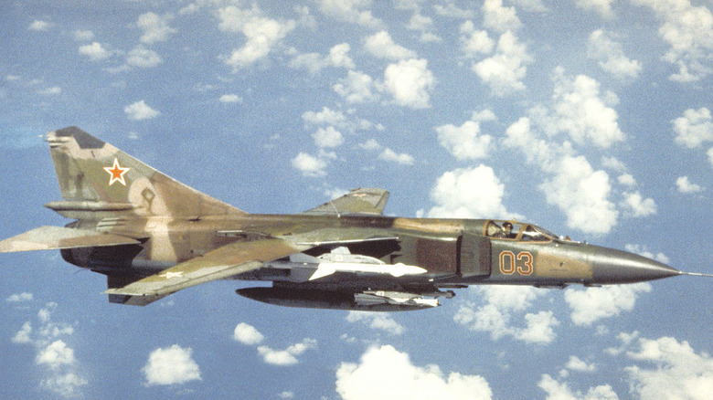 MiG-23 aircraft in flight from front right