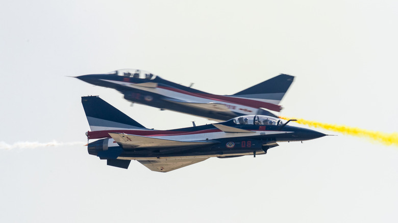 Two jets passing against each other in the air