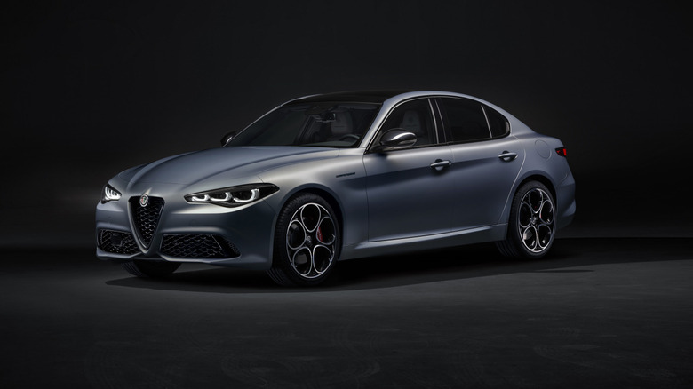 Alfa Romeo Giulia in gray against a dark background