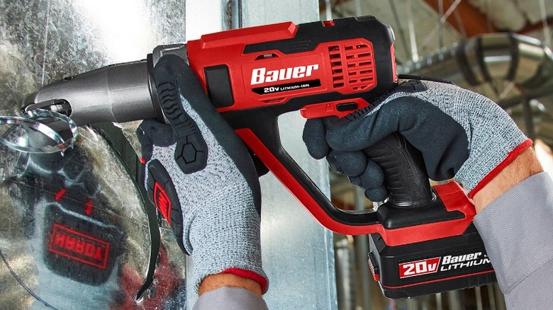 Person using Bauer steel cutter