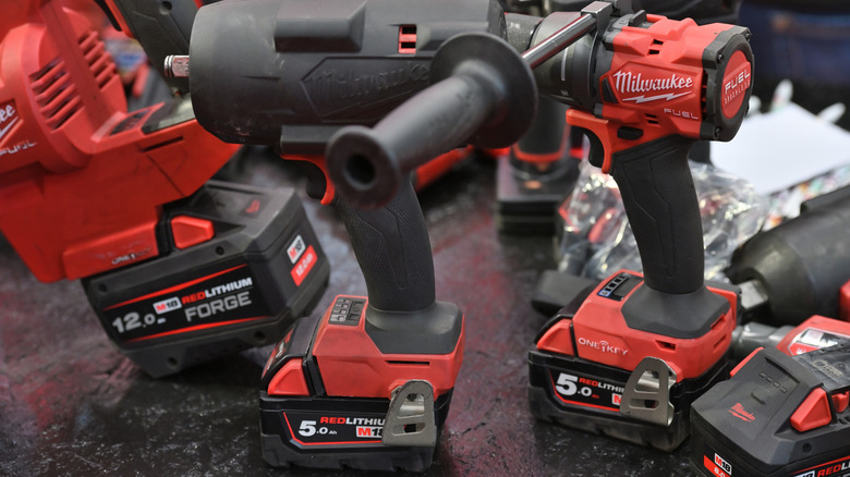 multiple milwaukee power tools with m18 batteries