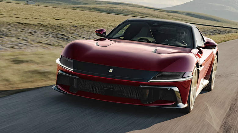 Ferrari 12Cilindri Manuale driving on open road, front-view