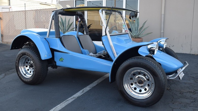 Meyers Tow'd Dune Buggy parked blue