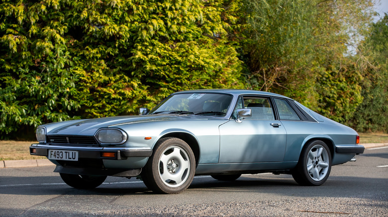Jaguar XJS parked on road, front-left view