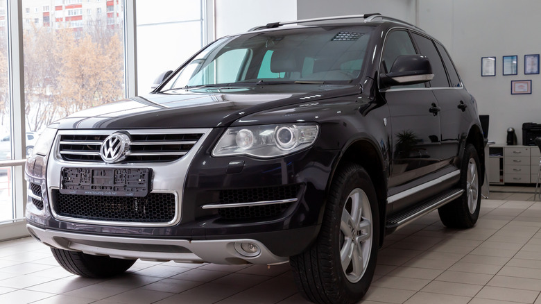 Volkswagen W12-equipped Touareg in dealership, front-left view