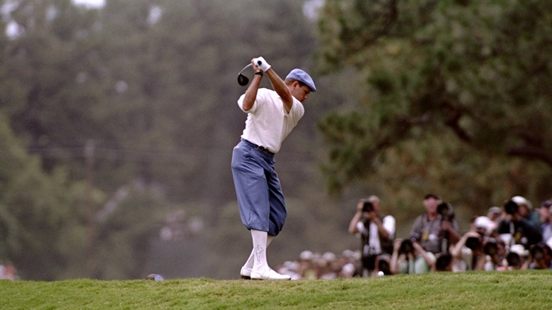 Payne Stewart teeing off at a golf course