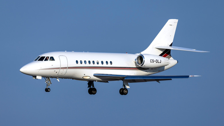 A Dassault Falcon 2000EX private jet arriving at runway 31