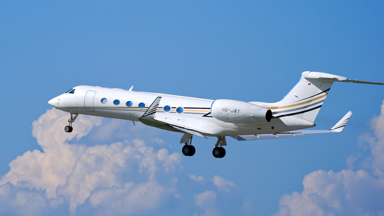 A Gulfstrea G550 private jet taking off from Zurich airport