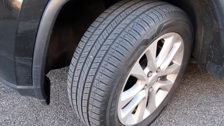 Nexen Roadian GTX tire on an unidentified Jeep model, full left lock