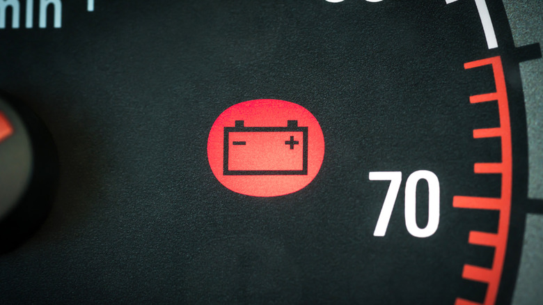 Red battery light flashing on dashboard