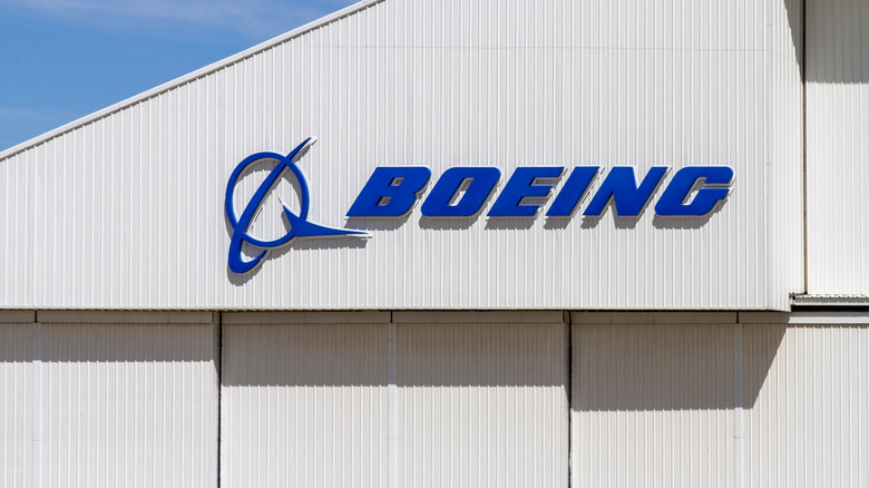Boeing logo on a modern hangar