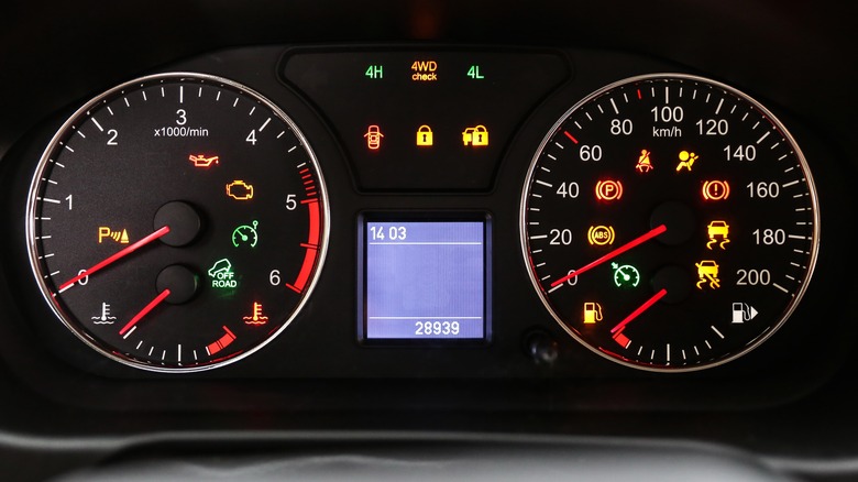car dashborad with lit up symbols