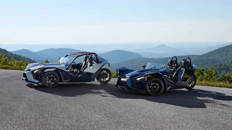 two polaris slingshot s motorcycles