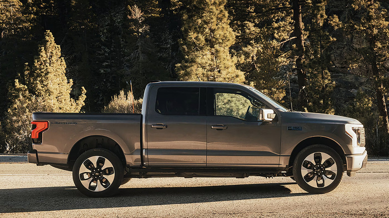 Ford F-150 Lightning parked in the woods