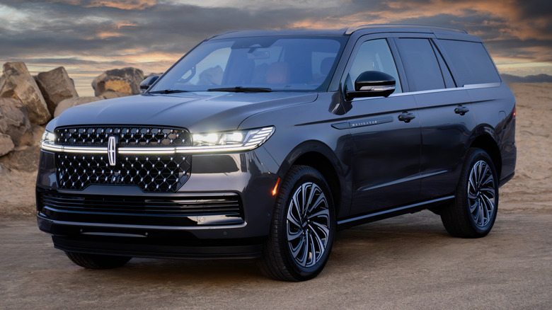 2025 Lincoln Navigator Black Label parked off-road with boulders in the background