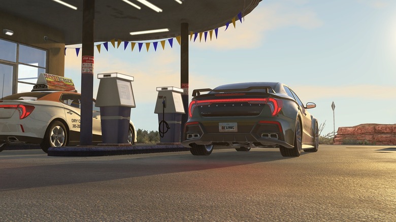 Two cars at gas station in BeamNG