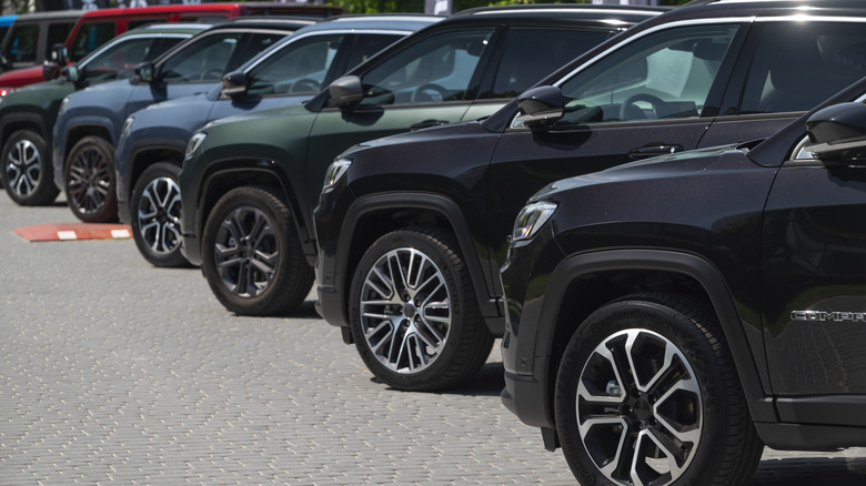 A round of SUVs parked next to each other.