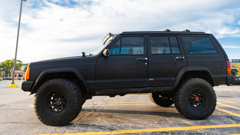 Modified XJ Jeep Cherokee in parking lot
