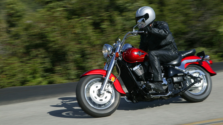 person riding kawasaki vulcan