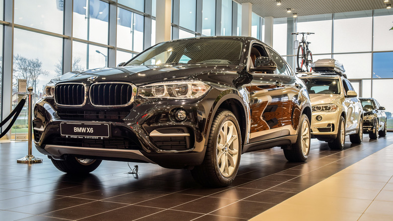 BMW vehicles in display room 