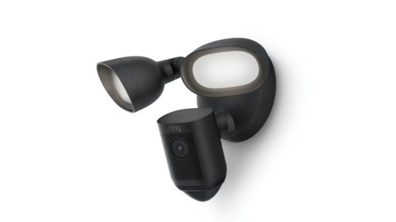 Black floodlight with camera attached