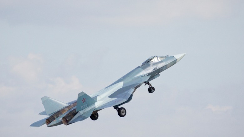 An Su-47 fighter jet on d