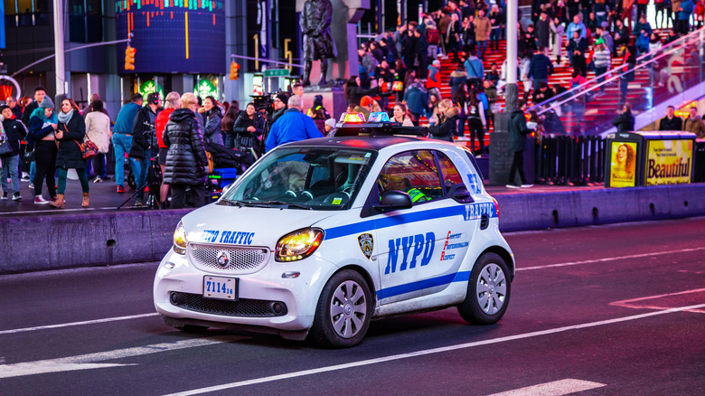 A Smart ForTwo police vehicle in the street of times square, New York City