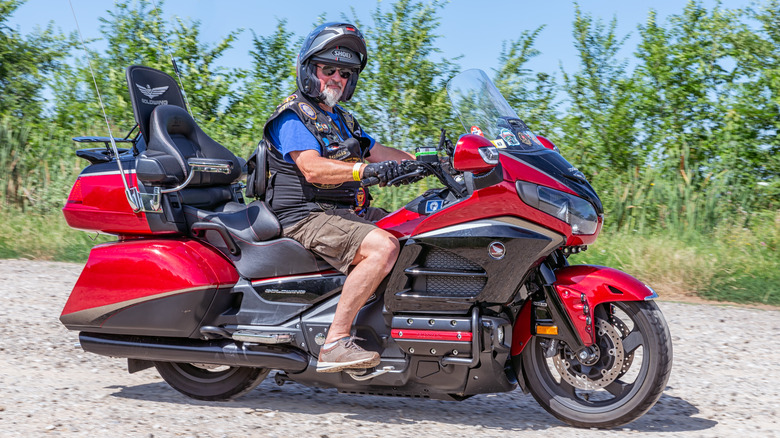 Person riding Honda Gold Wing